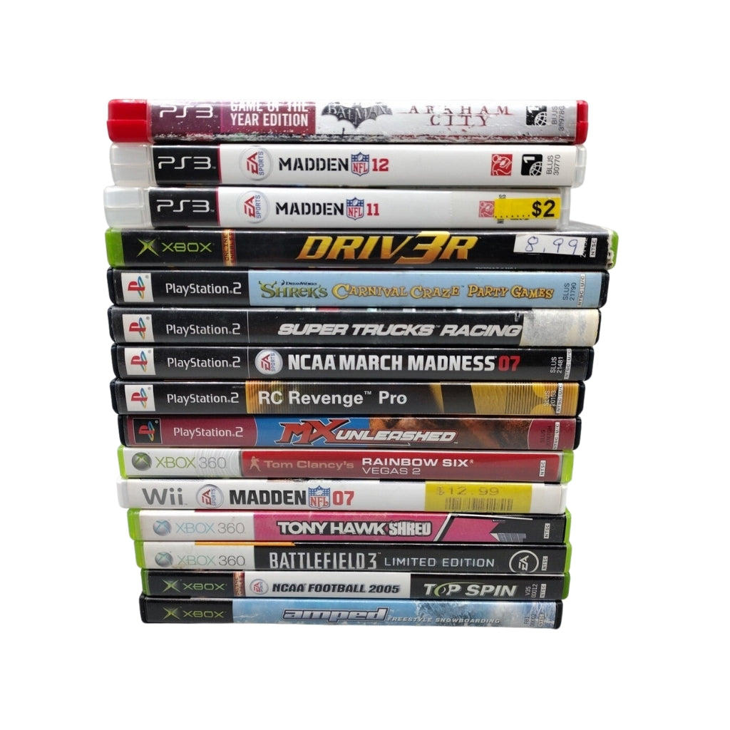 stack of video games from different systems