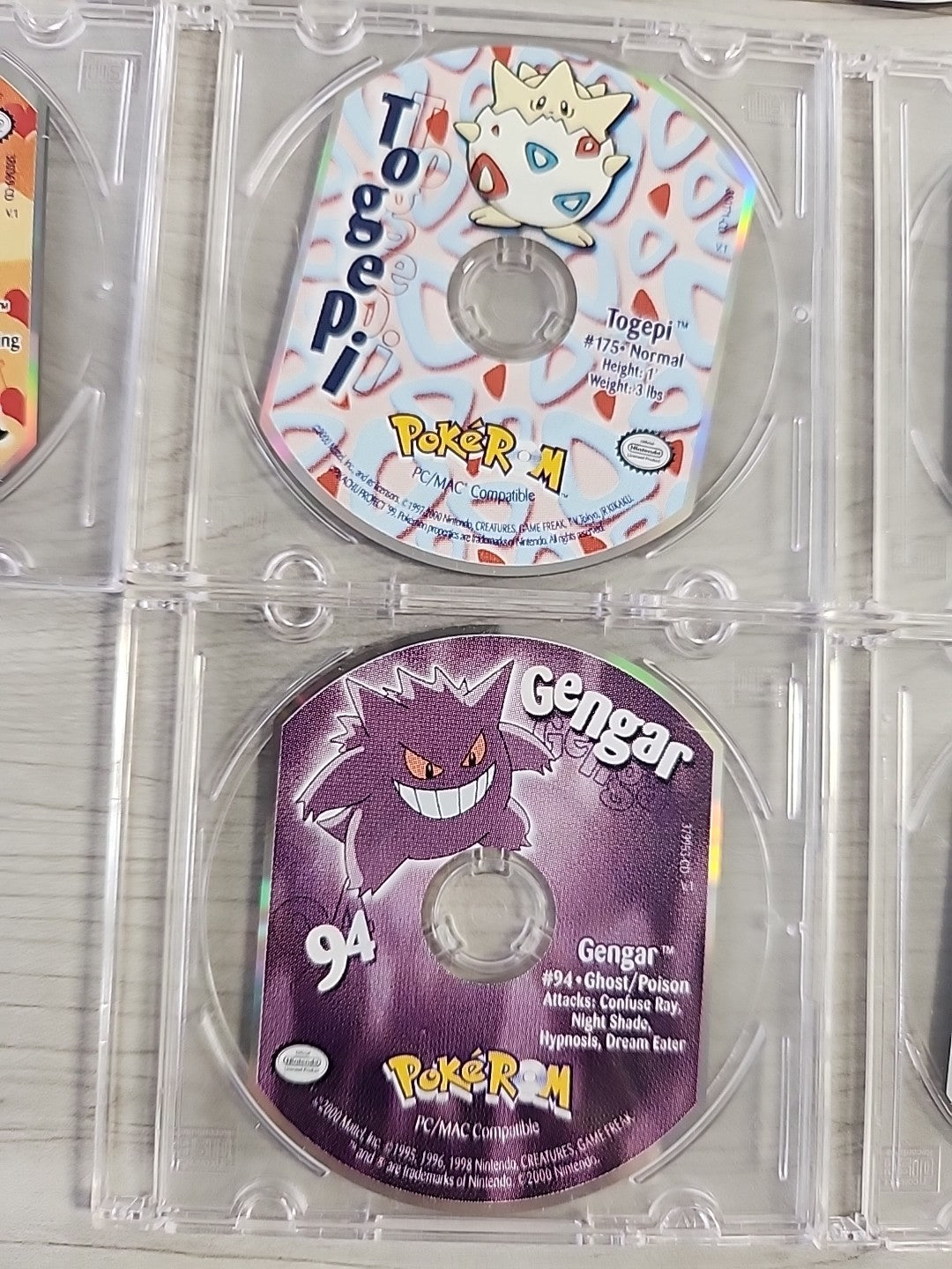 Pokemon PokeRom CD-ROM Lot Of 14 Bulbasaur Gengar Squirtle Lugia Hoothoot Ledyba