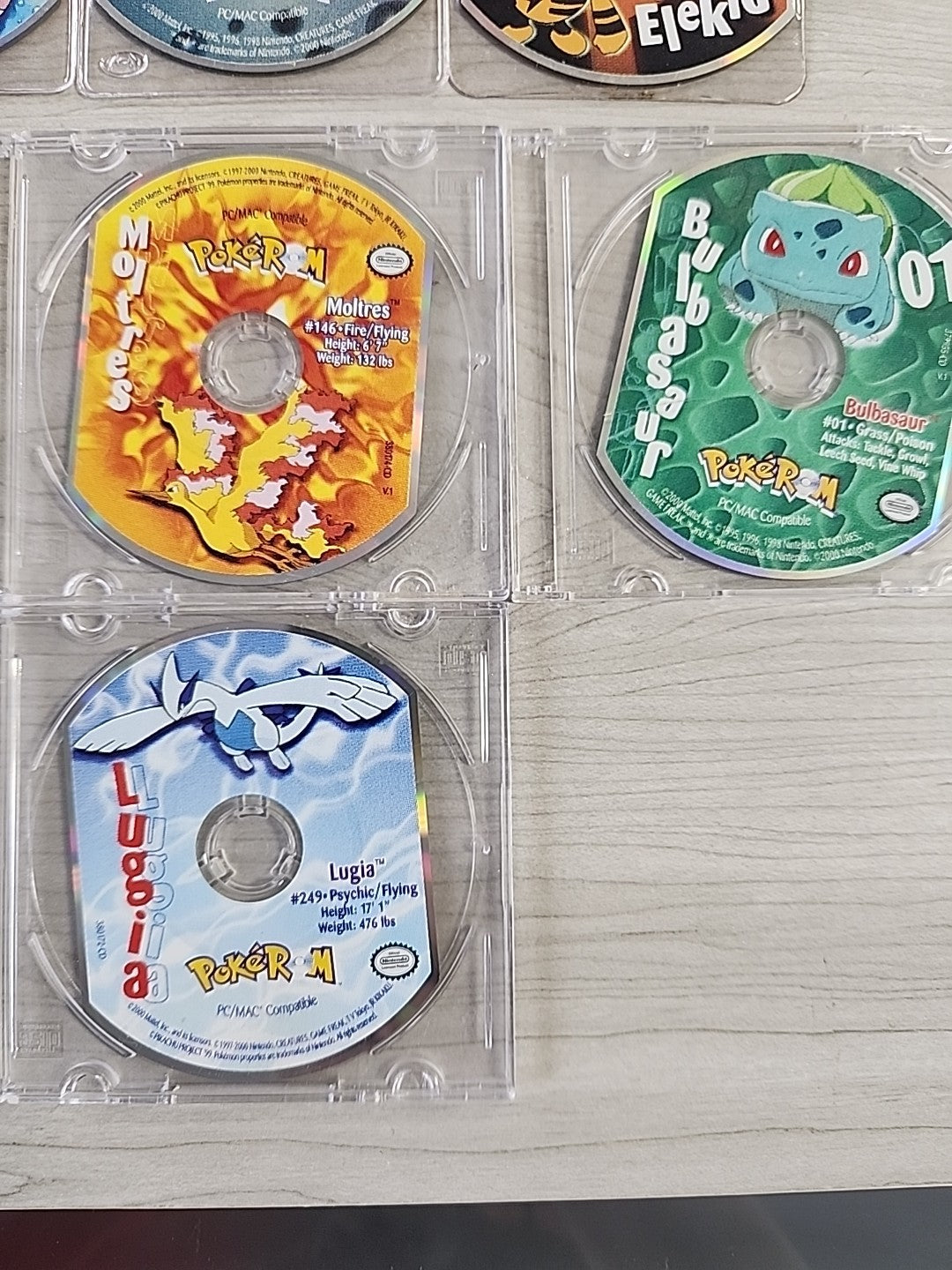 Pokemon PokeRom CD-ROM Lot Of 14 Bulbasaur Gengar Squirtle Lugia Hoothoot Ledyba