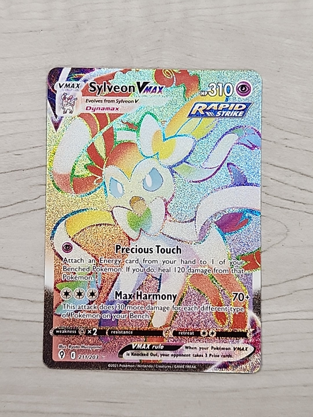 Sylveon VMAX Rainbow Rare 211/203 Pokemon SWSH Evolving Skies NM