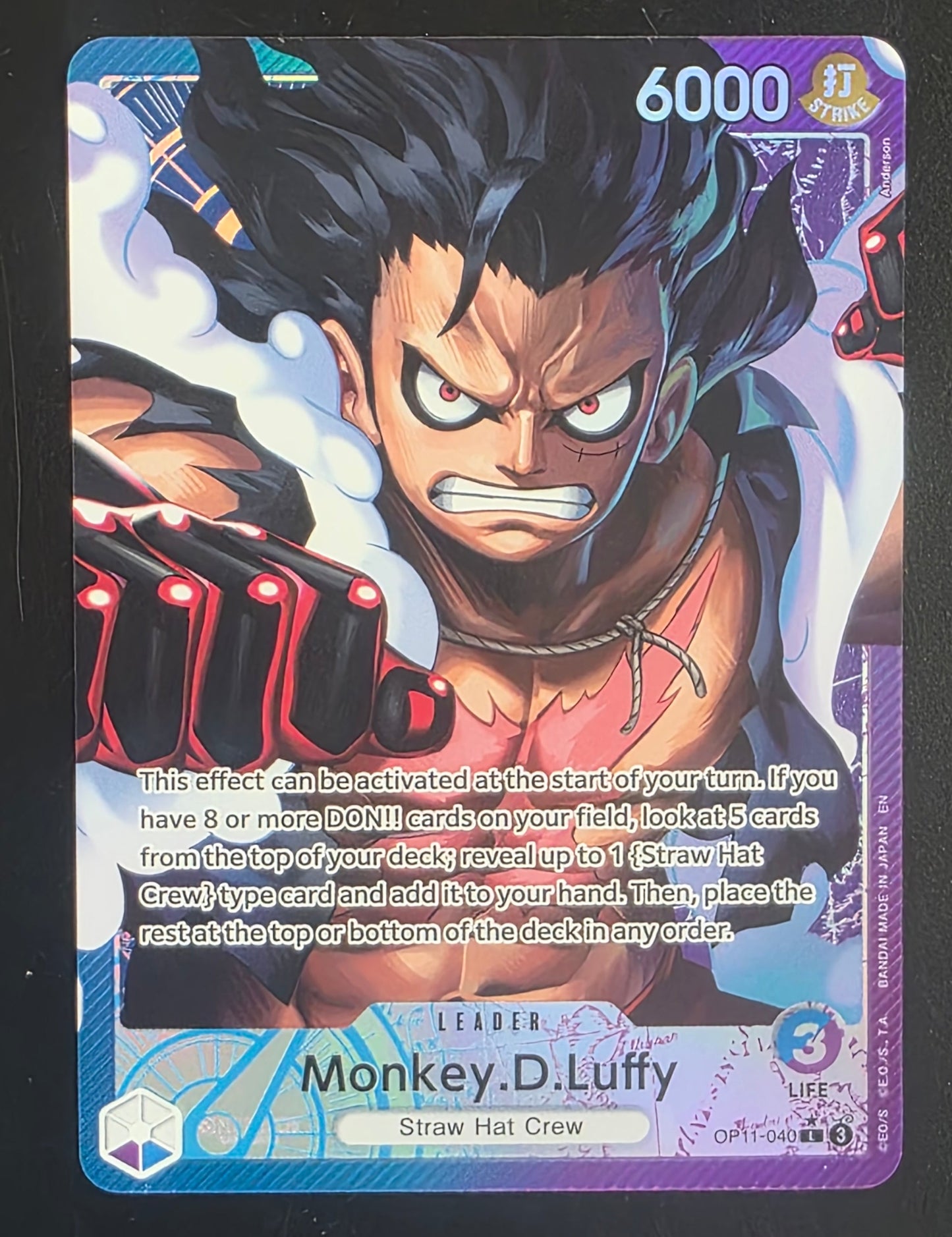 Card featuring an animated character with a purple border on a black background